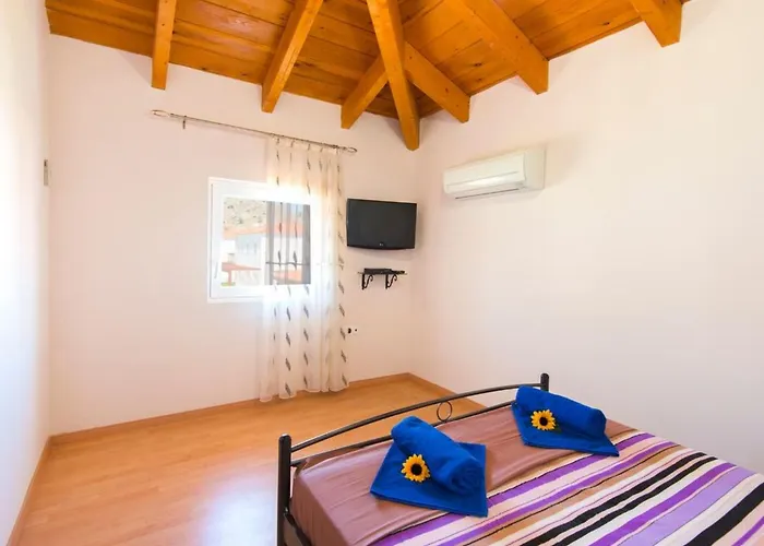 Haus In Kolympia Mit Garten Und Bergblick By Interhome Holiday home *